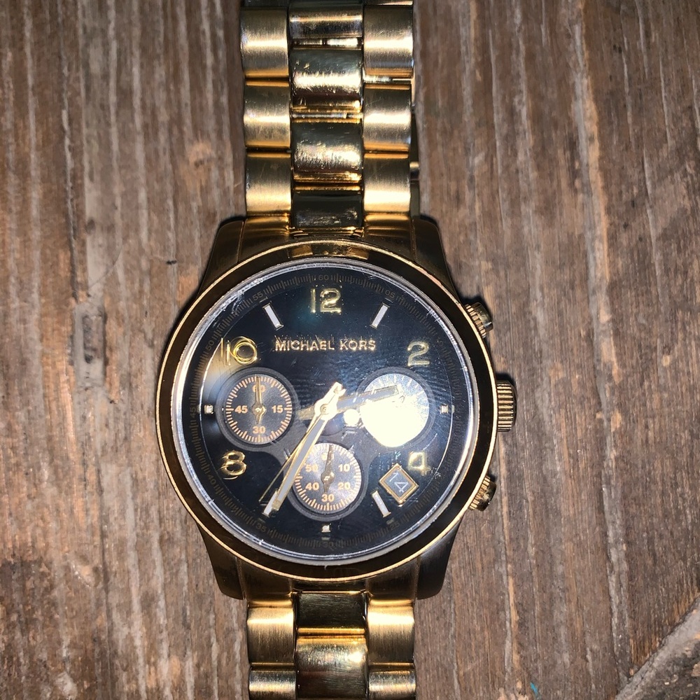 Michael Kors Gold with Black face watch